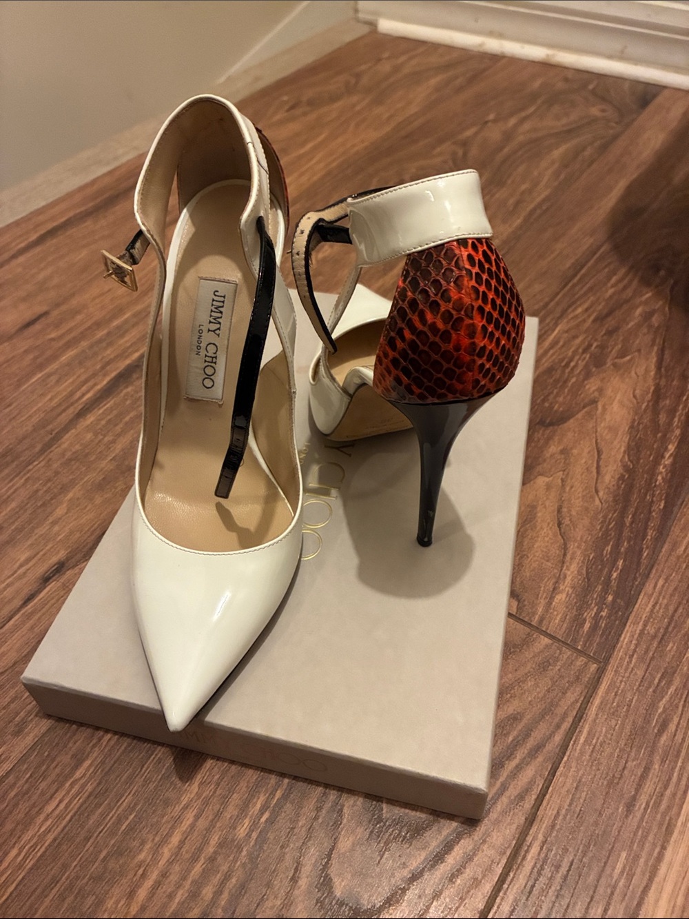 Jimmy Choo White Pointed-Toe Pumps with Red Snakeskin Heel